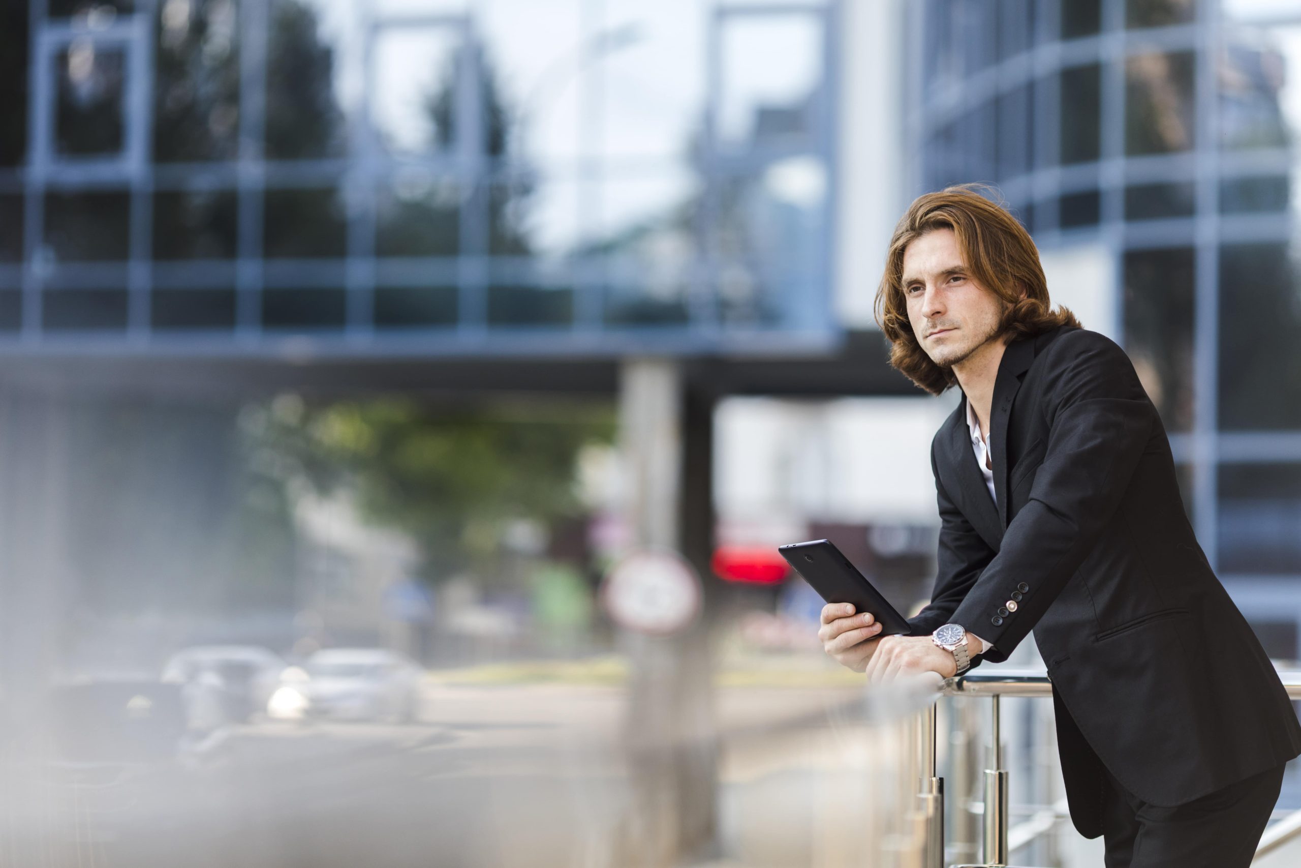 long hair men at airport looking for Taxi from Gatwick to Clapham Junction