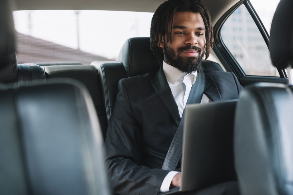 Black handsome men trabelling in taxi from Gatwick to London Kings Cross